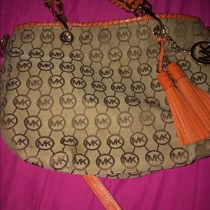 A Michael Kors purse in very good purse for work